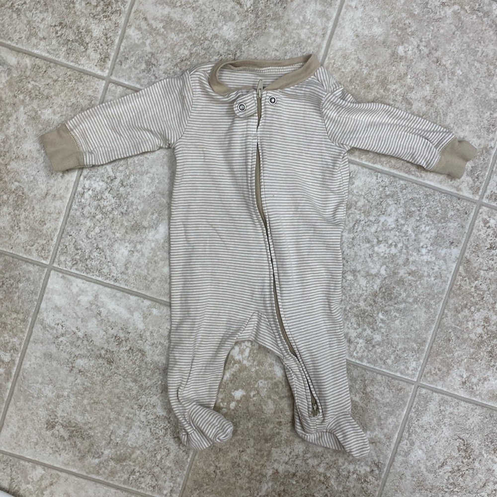 One piece neutral color onesie zip up